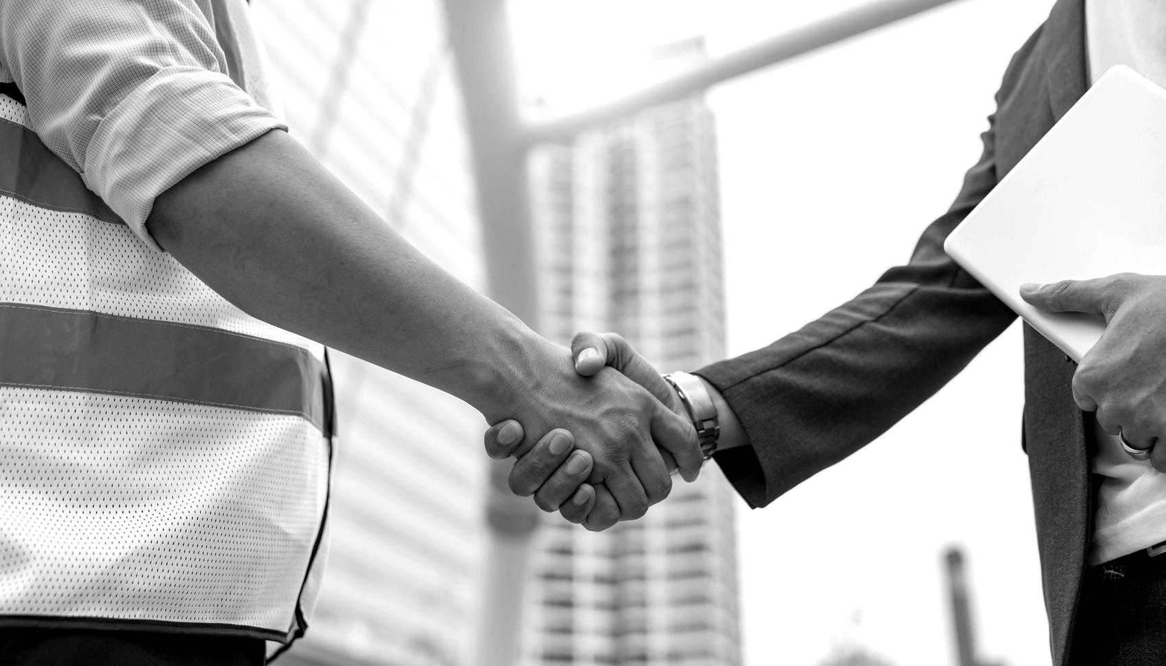 Contractor and Engineer Shaking Hands