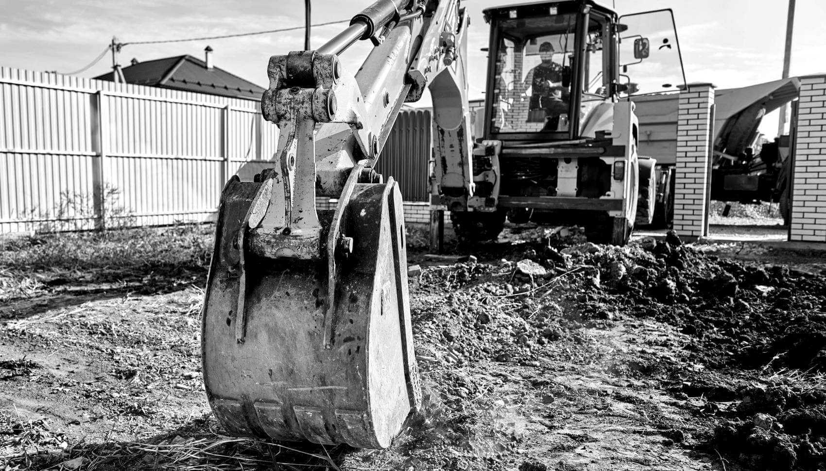 Banner Image - Get the Lead Out - Excavator Digging a Service - AdobeStock_384691445