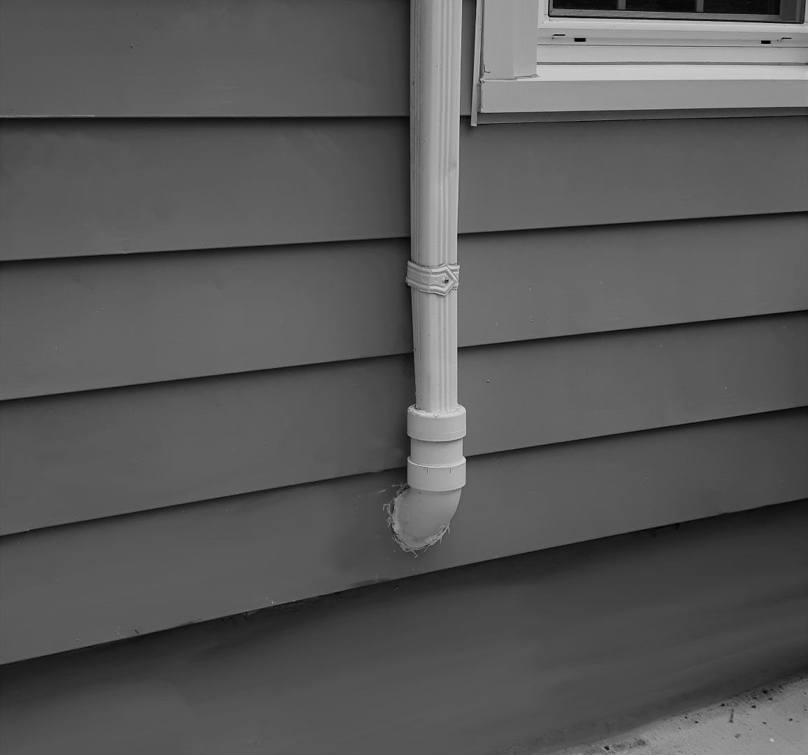 Downspout into house