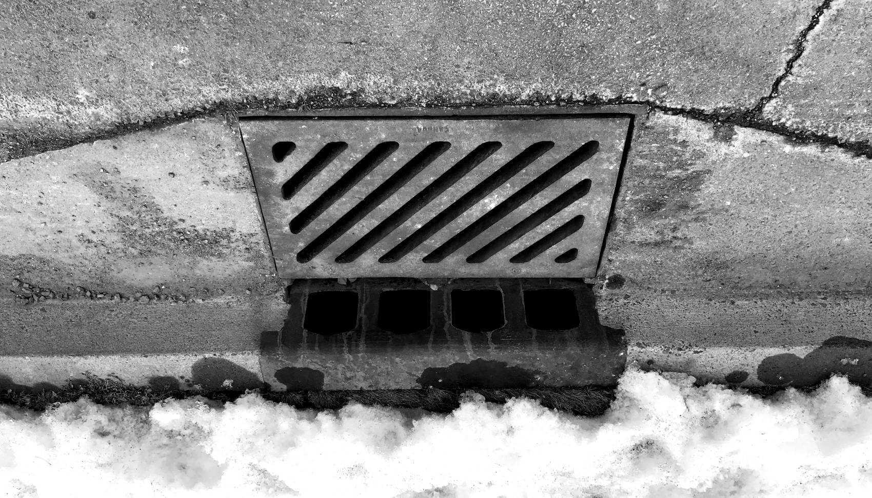 Banner Image - Clearing Storm Drains - Catchbasin Winter