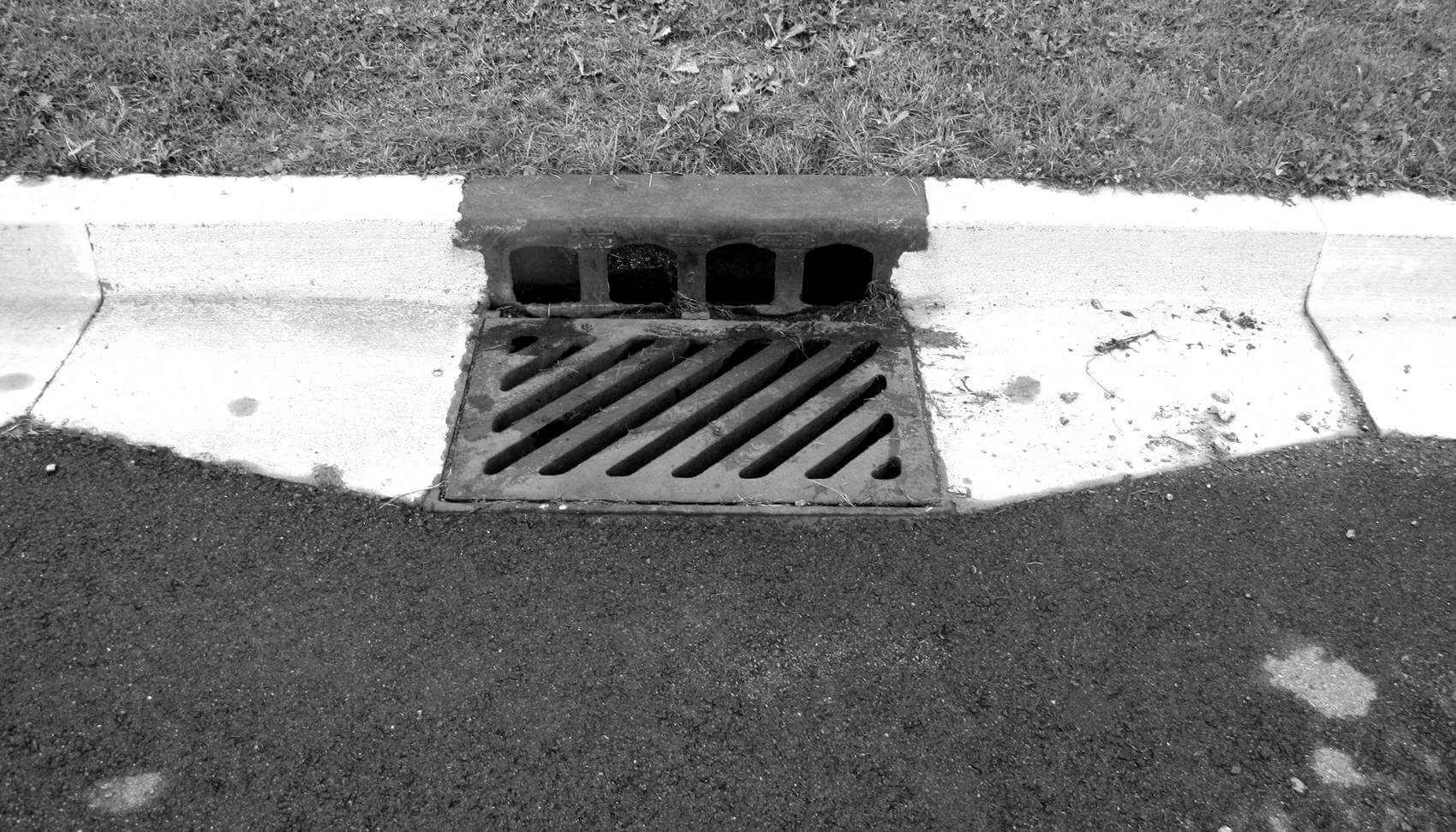 Catchbasin on side of road