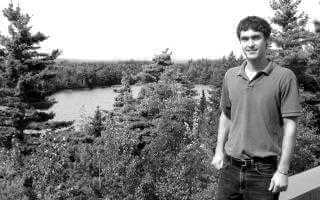 Halifax Water employee standing by Bennery Lake