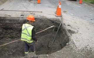 Halifax Water employee replacing a lead pipe